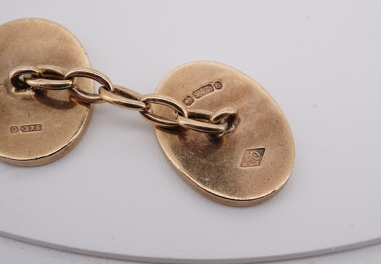 A pair of early to mid 20th century Austro Hungarian yellow metal and two colour enamel set oval cufflinks and a pair of 1930's engine turned 9ct gold oval cufflinks, gross weight 22 grams. Condition - fair
